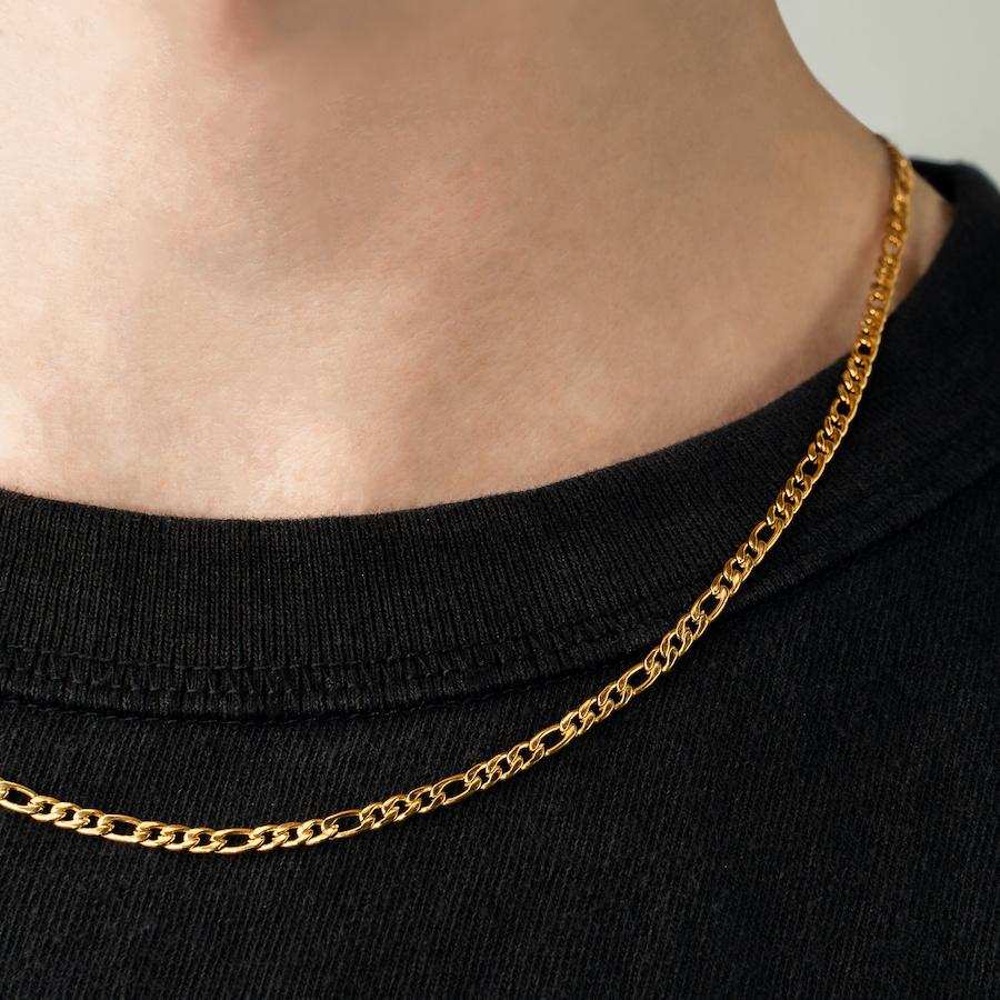 Our Gold Figaro Chain features our premium gold figaro chain and signature polished gold plate, engraved with RG&B.